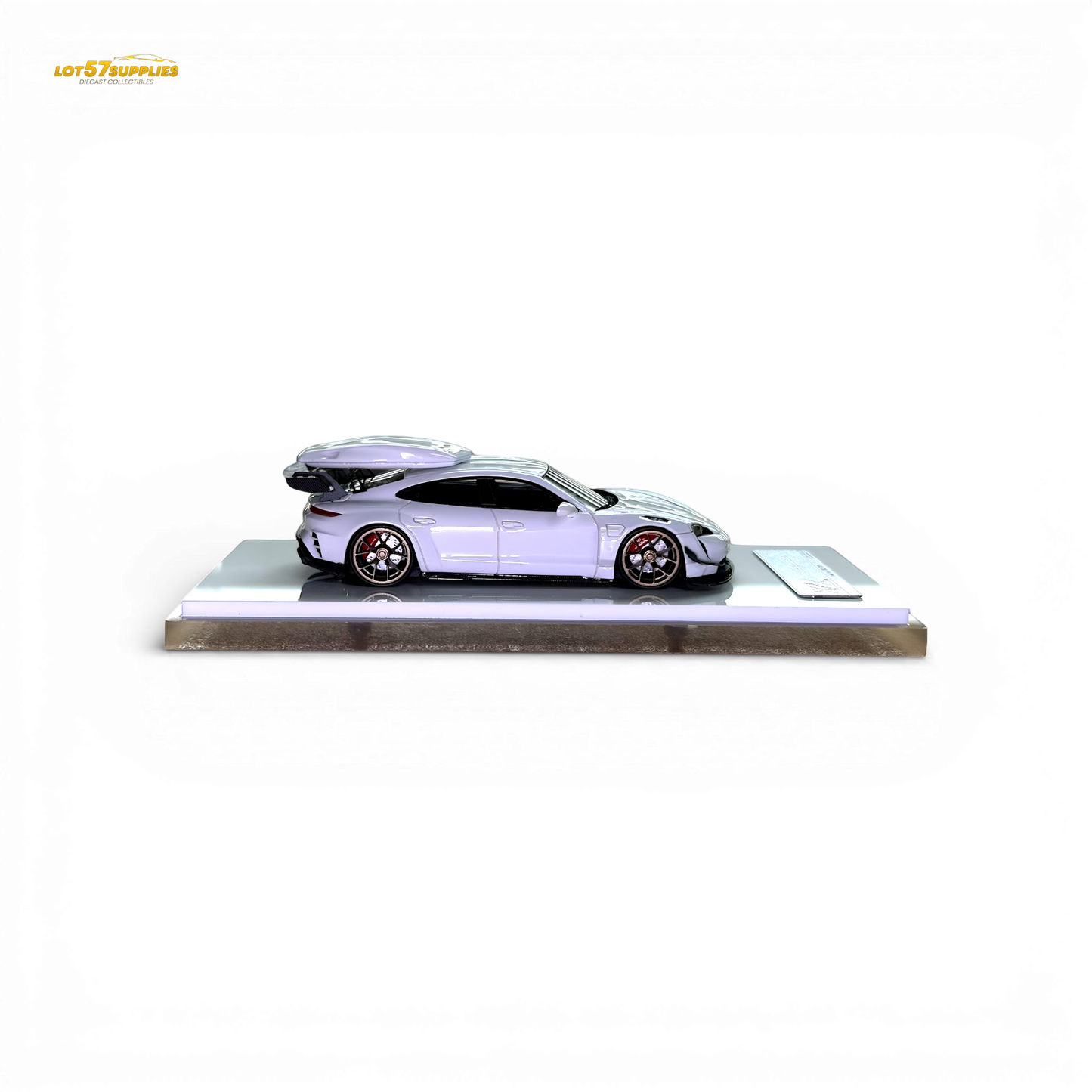 White Porsche Taycan diecast model with roof box, 1:64 scale, detailed miniature car by Lot57Supplies Diecast Shop.