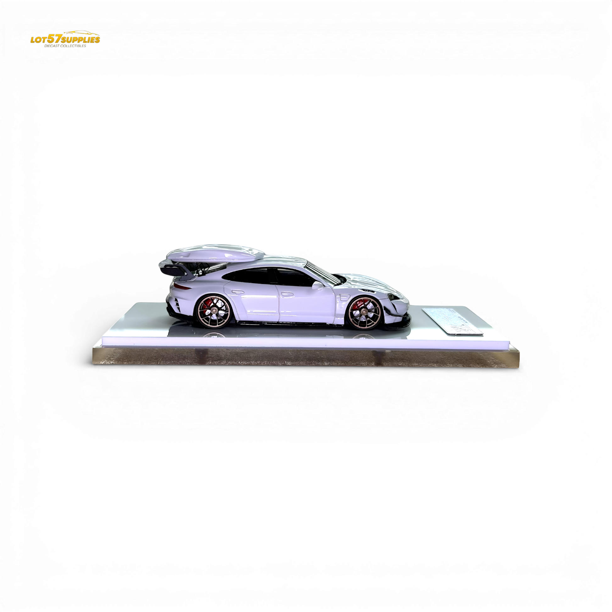 White Porsche Taycan diecast model with roof box, 1:64 scale, detailed miniature car by Lot57Supplies Diecast Shop.