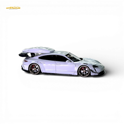White Porsche Taycan diecast model with roof box, 1:64 scale, detailed miniature car from Lot57Supplies Diecast Shop.