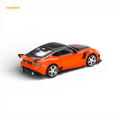 Orange Mini-GT Nissan Z VeilSide FFZ400 diecast model in 1:64 scale, detailed miniature car with vibrant orange finish.