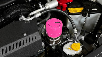 JDMuscle Perrin hyper pink oil filter cover for Subaru WRX, BRZ, and Toyota GR86 engine oil caps, vibrant pink finish.