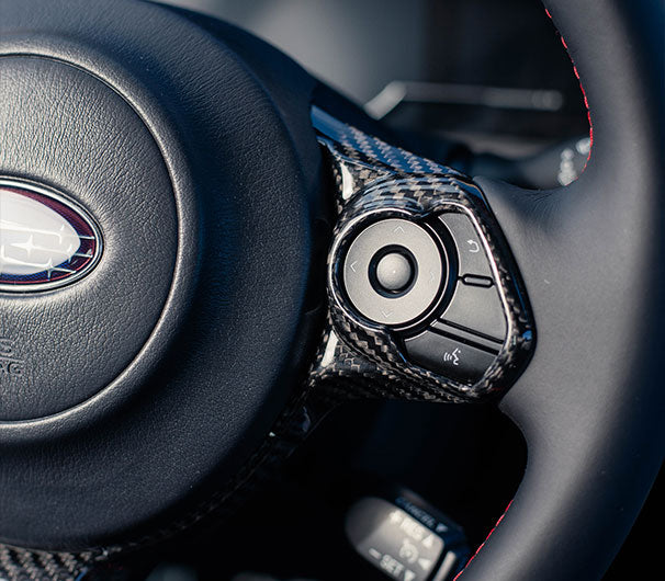 OLM LE dry carbon fiber steering wheel trim for Subaru BRZ and Toyota GR86