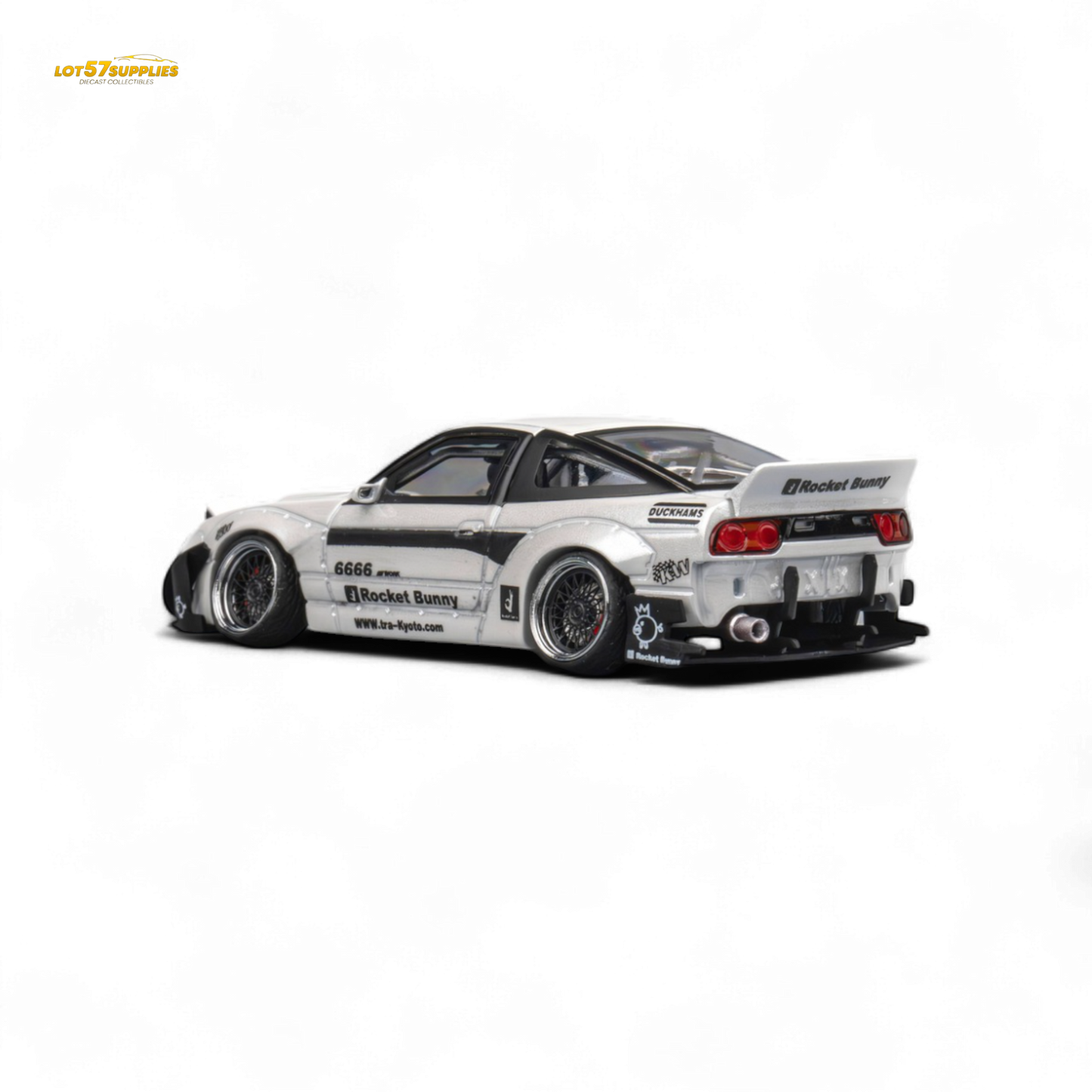 White Nissan 180SX MicroTurbo diecast model with Pandem Rocket Bunny body kit, 1:64 scale, detailed miniature vehicle.