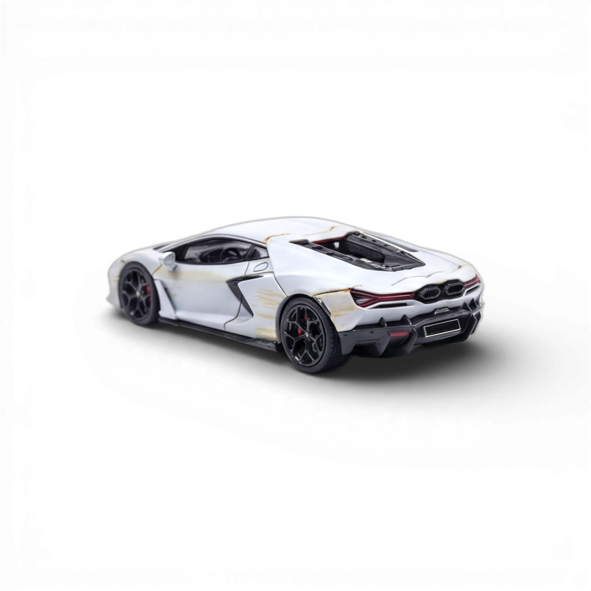 Matte gray Lamborghini Flame Revuelto 1:64 resin diecast model, detailed miniature car for collectors.