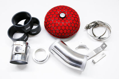 HKS cold air intake full kit for 2015 Subaru WRX STI EJ257 engine, showing the black intake pipe and filter assembly.
