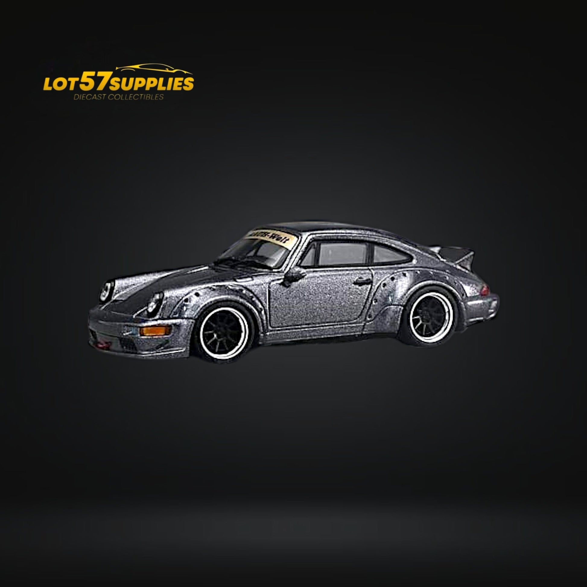 Metallic gray CM Model Porsche 964 Widebody diecast car, 1:64 scale, detailed replica with distinct widebody design.