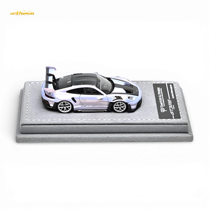 Purple 1:64 scale Porsche 911 992 GT3 RS diecast model by Lot57Supplies Diecast Shop, detailed miniature car on a plain background.