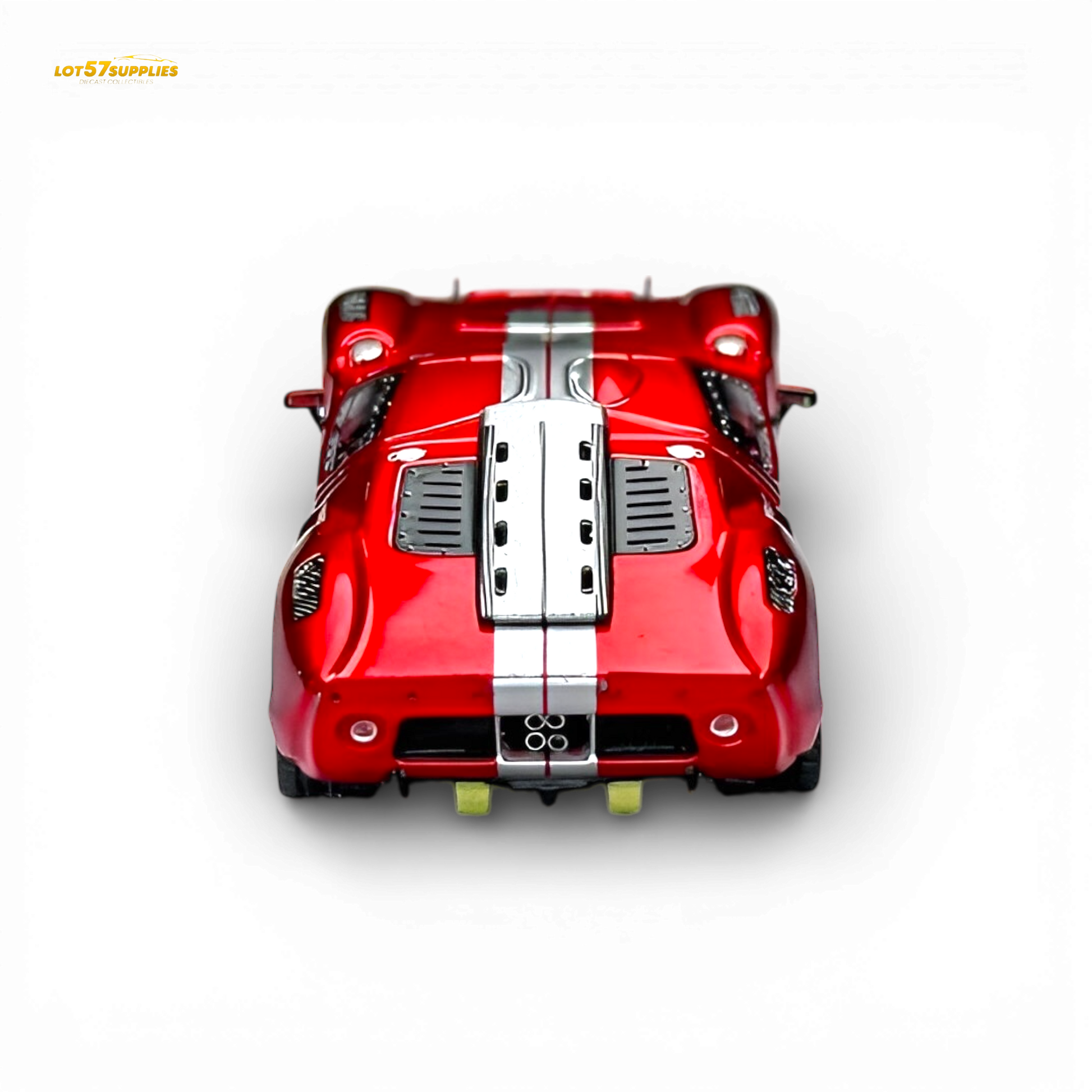 Red Ford GT40 diecast model by Rhino Model RM, 1:64 scale, transparent red finish, detailed miniature car.