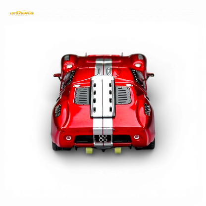 Red Ford GT40 diecast model by Rhino Model RM, 1:64 scale, transparent red finish, detailed miniature car.
