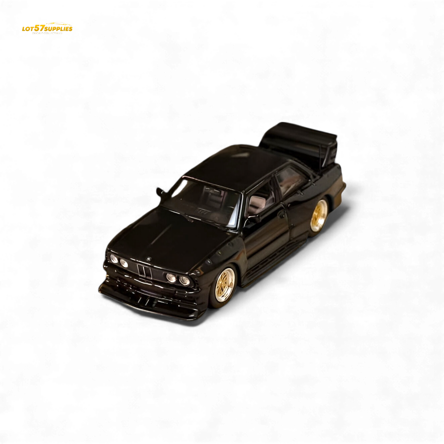 Black SW BMW E30 M3 LTO diecast car model in 1:64 scale from Lot57Supplies Diecast Shop, showing detailed exterior and wheels.
