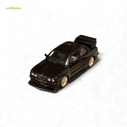 Black SW BMW E30 M3 LTO diecast car model in 1:64 scale from Lot57Supplies Diecast Shop, showing detailed exterior and wheels.