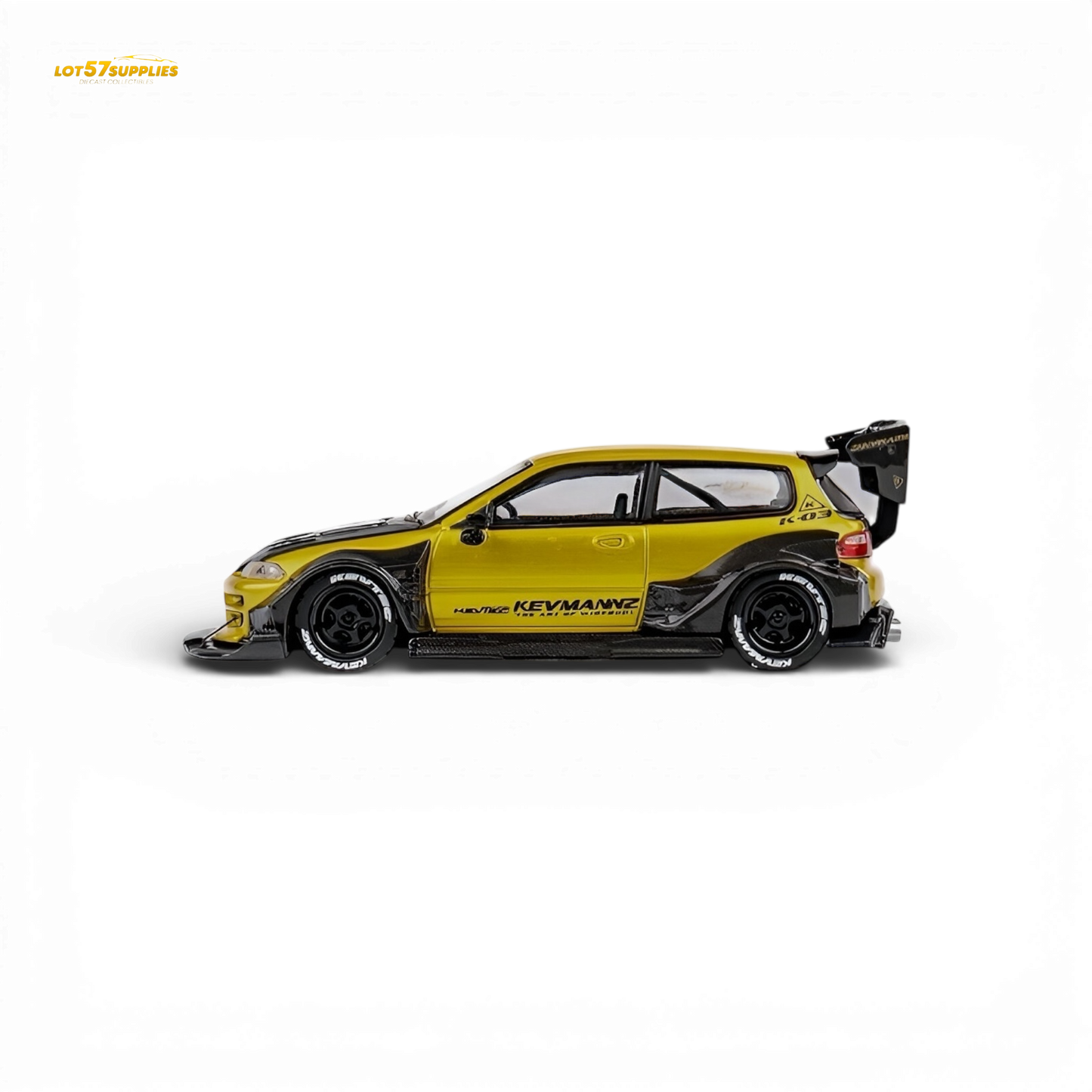 Detailed close-up of a gold carbon fiber short tail for Honda DCM Civic EG Ver.1 diecast model in 1:64 scale.