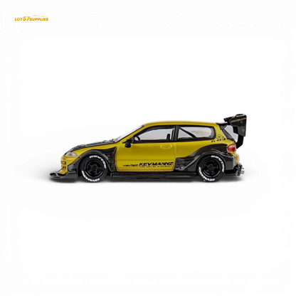 Detailed close-up of a gold carbon fiber short tail for Honda DCM Civic EG Ver.1 diecast model in 1:64 scale.