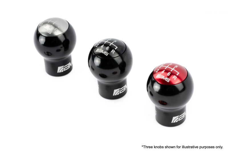 FR SPORT AMS Performance Subaru WRX/STi 6-speed billet shift knob with red, black, and gunmetal caps for manual transmission.