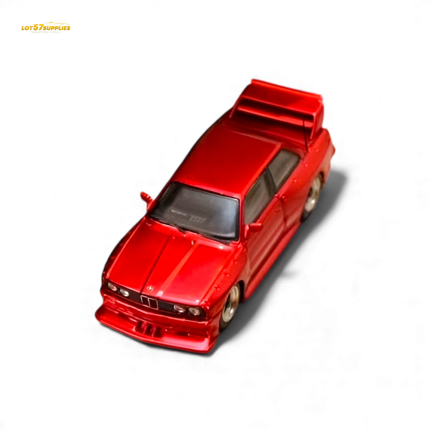 Red SW BMW E30 M3 LTO diecast model car in 1:64 scale with detailed features and sporty design.
