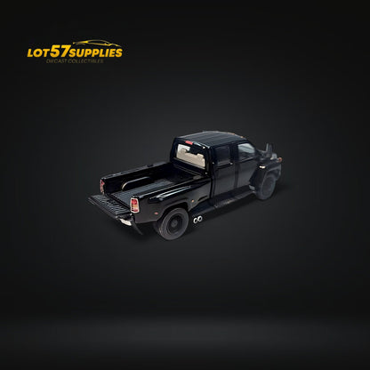 Black 1:64 scale Chevrolet Kodiak pickup diecast truck from Lot57Supplies Diecast Shop, detailed model with cab and truck bed.