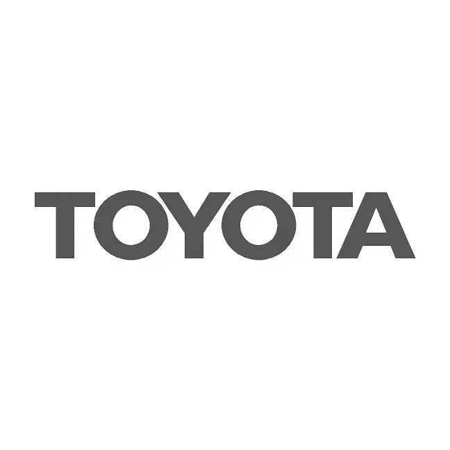 Carbonized gray Toyota rear tailgate emblem overlay for 2024+ Land Cruiser, made by StickerFab, shown on vehicle tailgate.