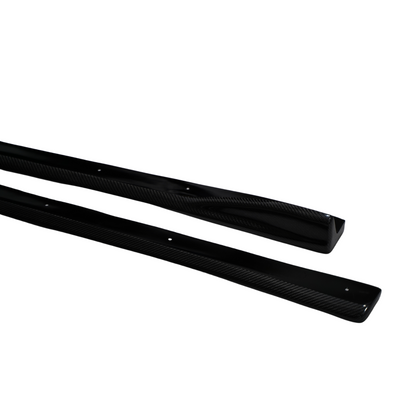 JDMuscle 08-14 Subaru WRX/STI Tanso carbon fiber CS style side skirts installed on vehicle, showcasing aerodynamic design and finish.