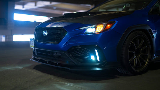 OLM RD1 Style matte black ABS front lip for 2022+ Subaru WRX, 3-piece design enhances sporty front bumper appearance.