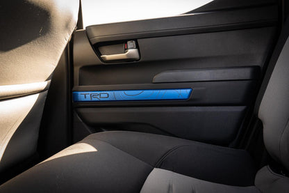Vinyl interior door line overlays for 2024+ Toyota Tacoma by StickerFab, showcasing sleek, custom-fit door trim accents.