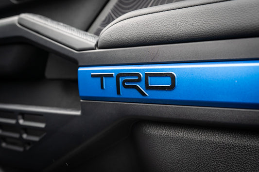 Vinyl interior door line overlays for 2025+ Toyota 4Runner by StickerFab, shown installed on vehicle doors.