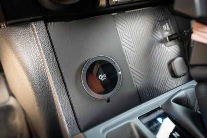 StickerFab 25W Magsafe wireless charger pad mounted in factory cubby for 2024+ Tacoma and 2025+ 4Runner phone mounts.