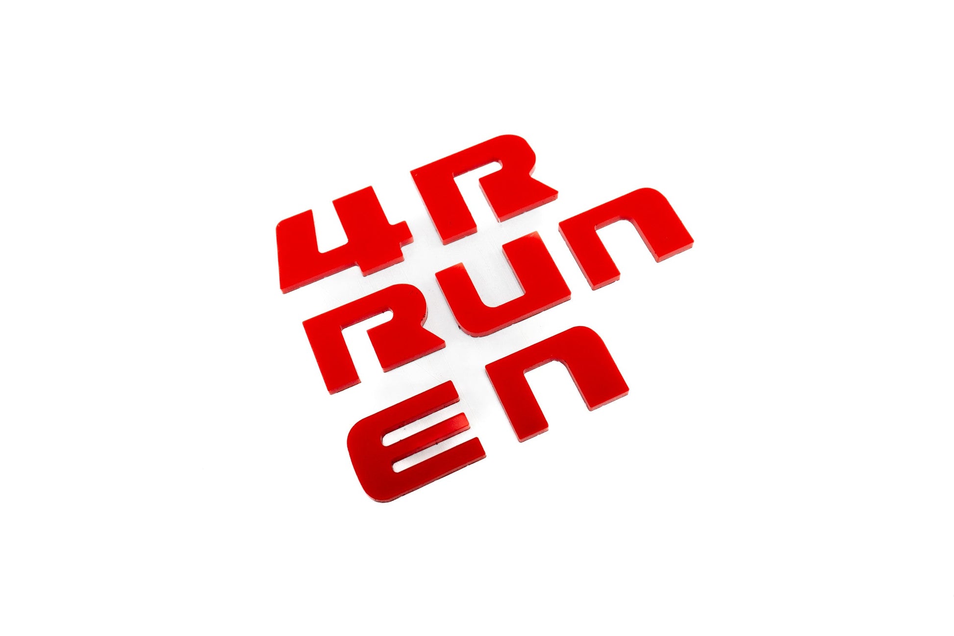 4RUNNER dash letters with template for 2025+ Toyota 4Runner interior, vinyl decal from StickerFab, shown on a vehicle dashboard.