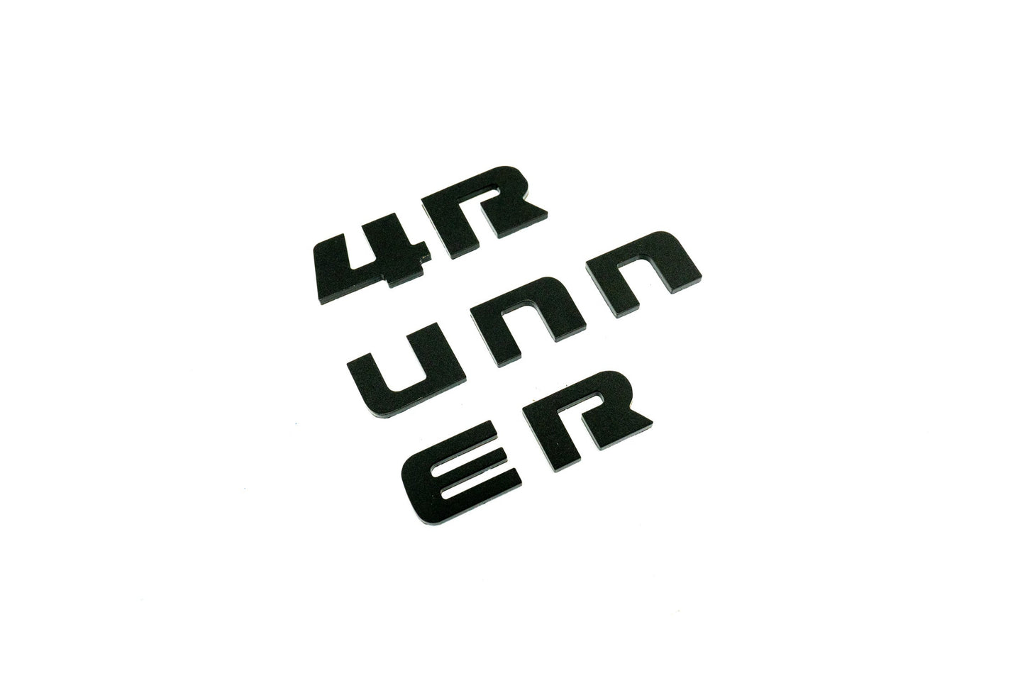 4RUNNER dash letters with template for 2025+ Toyota 4Runner interior, vinyl sticker kit by StickerFab displayed on dashboard.