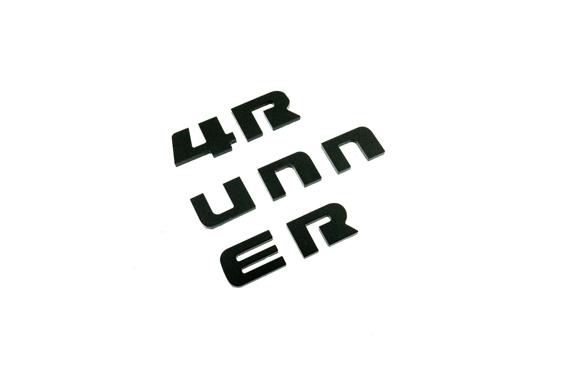 4RUNNER dash letters with template for 2025+ Toyota 4Runner interior, vinyl sticker kit by StickerFab displayed on dashboard.