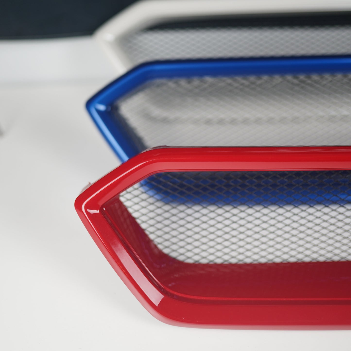 JDMuscle CS Style V2 front bumper grille for 2018-2021 Subaru WRX/STI in paint-matched and gloss black finish, mounted on vehicle.