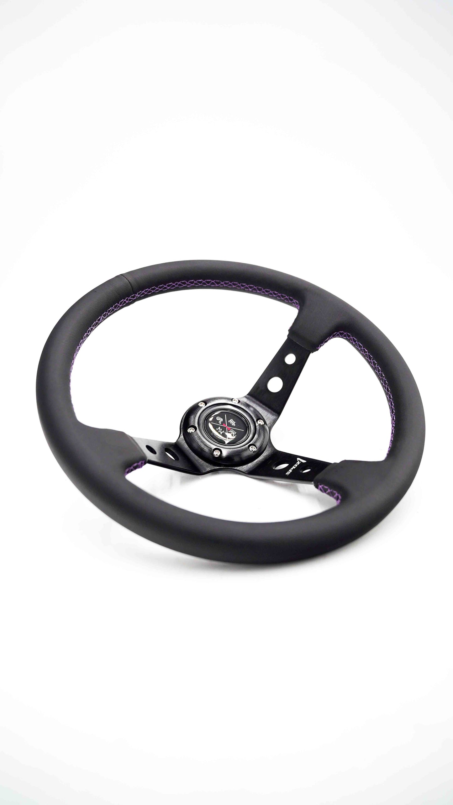 Purple lined steering wheel by Speedzone Performance LLC, featuring a sleek design and ergonomic grip for vehicle steering.