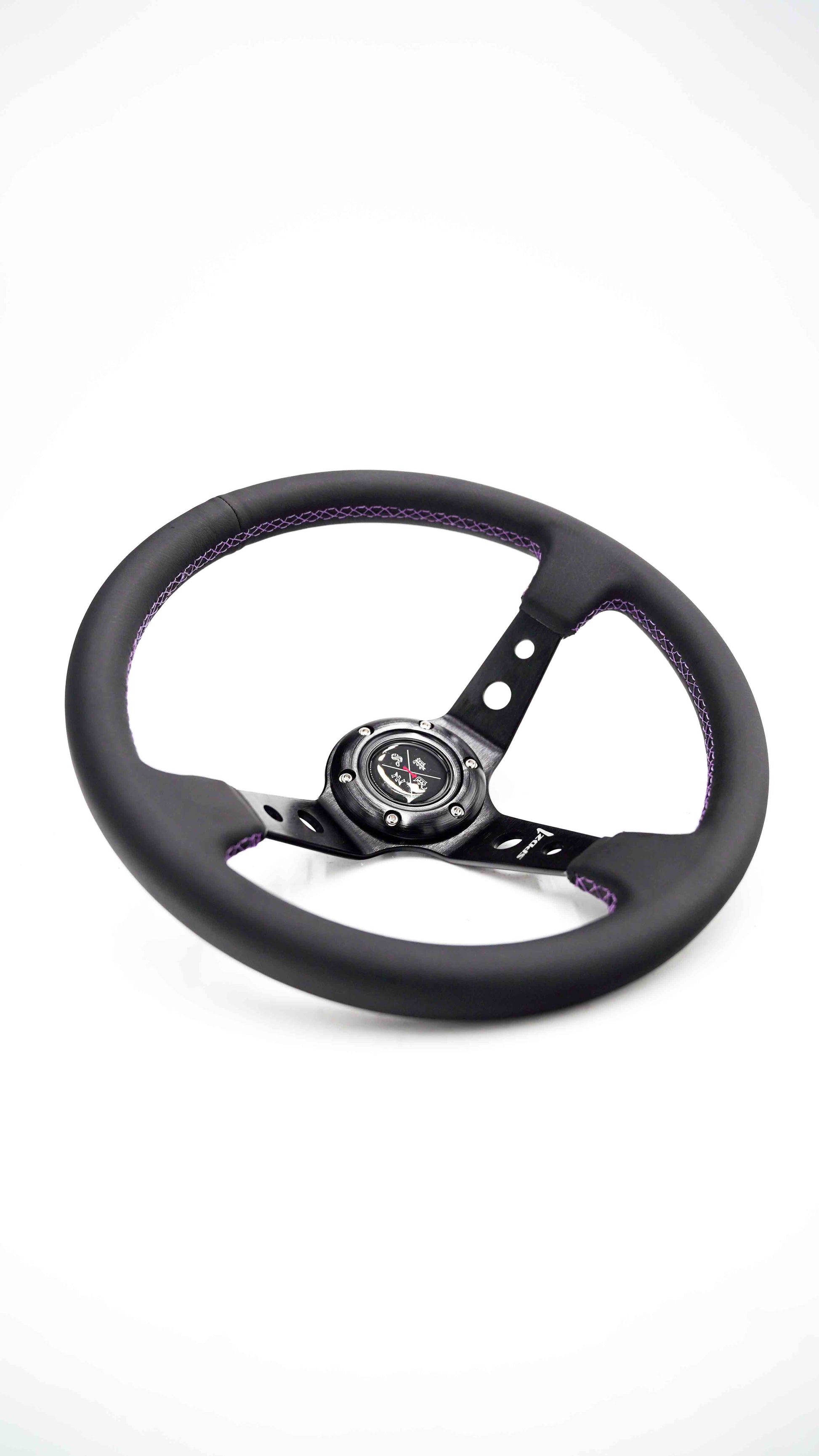 Purple lined steering wheel by Speedzone Performance LLC, featuring a sleek design and ergonomic grip for vehicle steering.