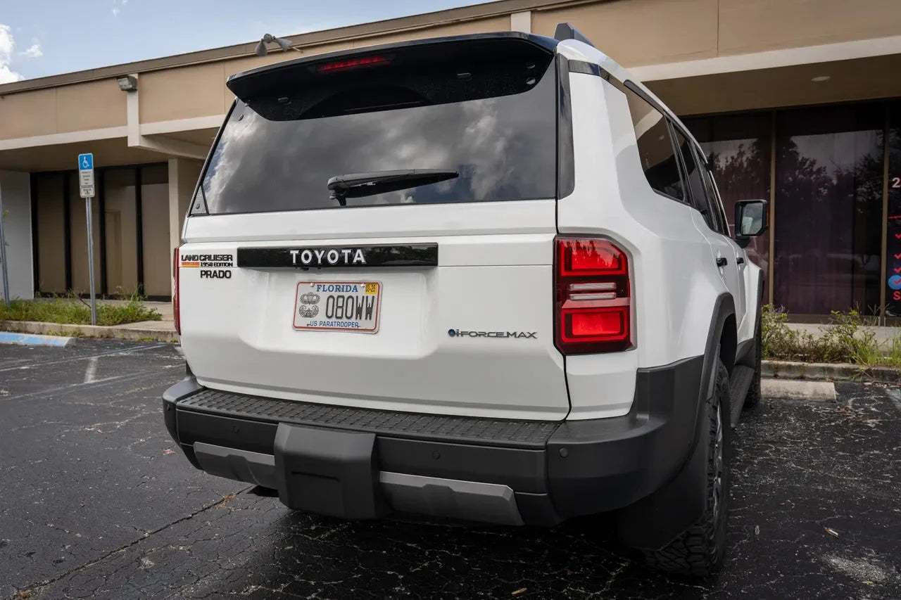 Toyota Land Cruiser 2024+ rear tailgate emblem overlays by StickerFab, featuring stylish chrome design and precise fit.