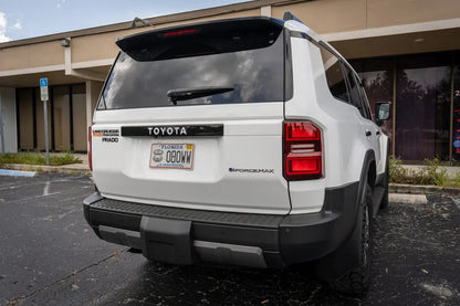 Toyota Land Cruiser 2024+ rear tailgate emblem overlays by StickerFab, featuring stylish chrome design and precise fit.