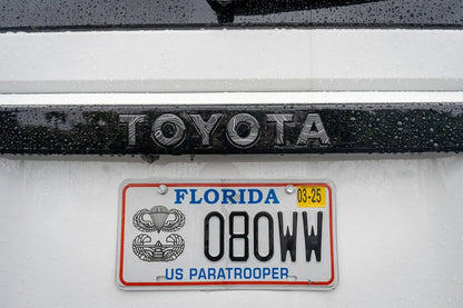 Toyota Land Cruiser 2024+ rear tailgate emblem overlays by StickerFab, showcasing sleek design for vehicle customization.
