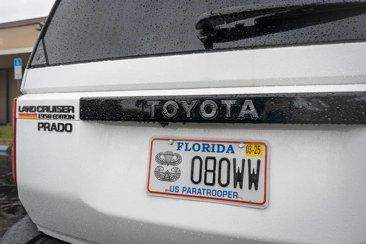 Toyota Land Cruiser 2024+ Topo rear tailgate emblem overlays by StickerFab, showcasing sleek design on vehicle tailgate.