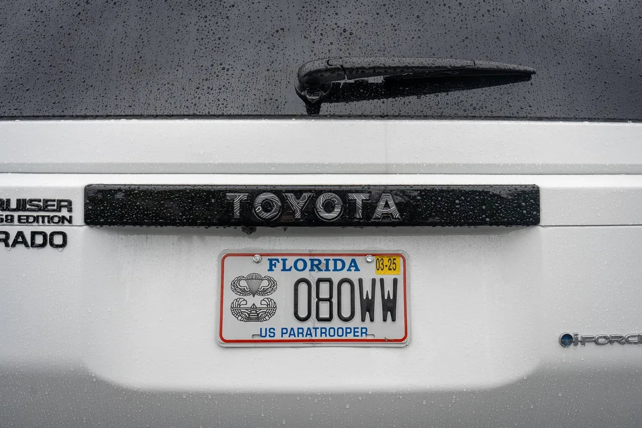 Toyota Land Cruiser 2024+ Topo rear tailgate emblem overlays by StickerFab, stylish decal for vehicle customization.