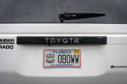 Toyota Land Cruiser 2024+ Topo rear tailgate emblem overlays by StickerFab, stylish decal for vehicle customization.