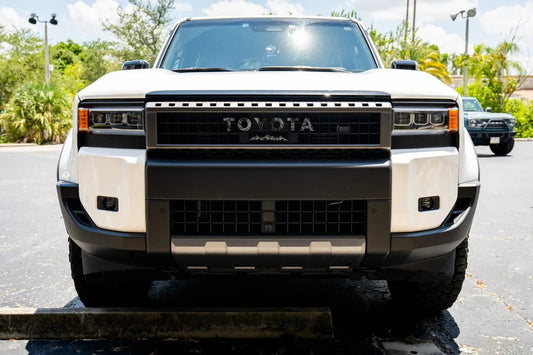 Toyota Land Cruiser and FJ Cruiser front grille emblem kit by StickerFab, featuring stylish emblems for 2007-2014 FJ Cruiser and 2024+ Land Cruiser.
