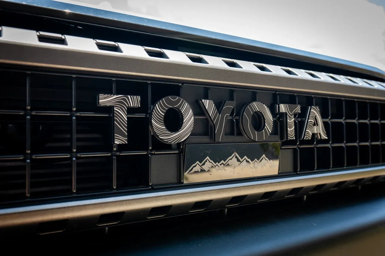 Toyota Land Cruiser and FJ Cruiser emblem kit by StickerFab, front grille emblems for 2007-2014 FJ Cruiser and 2024+ Land Cruiser models.