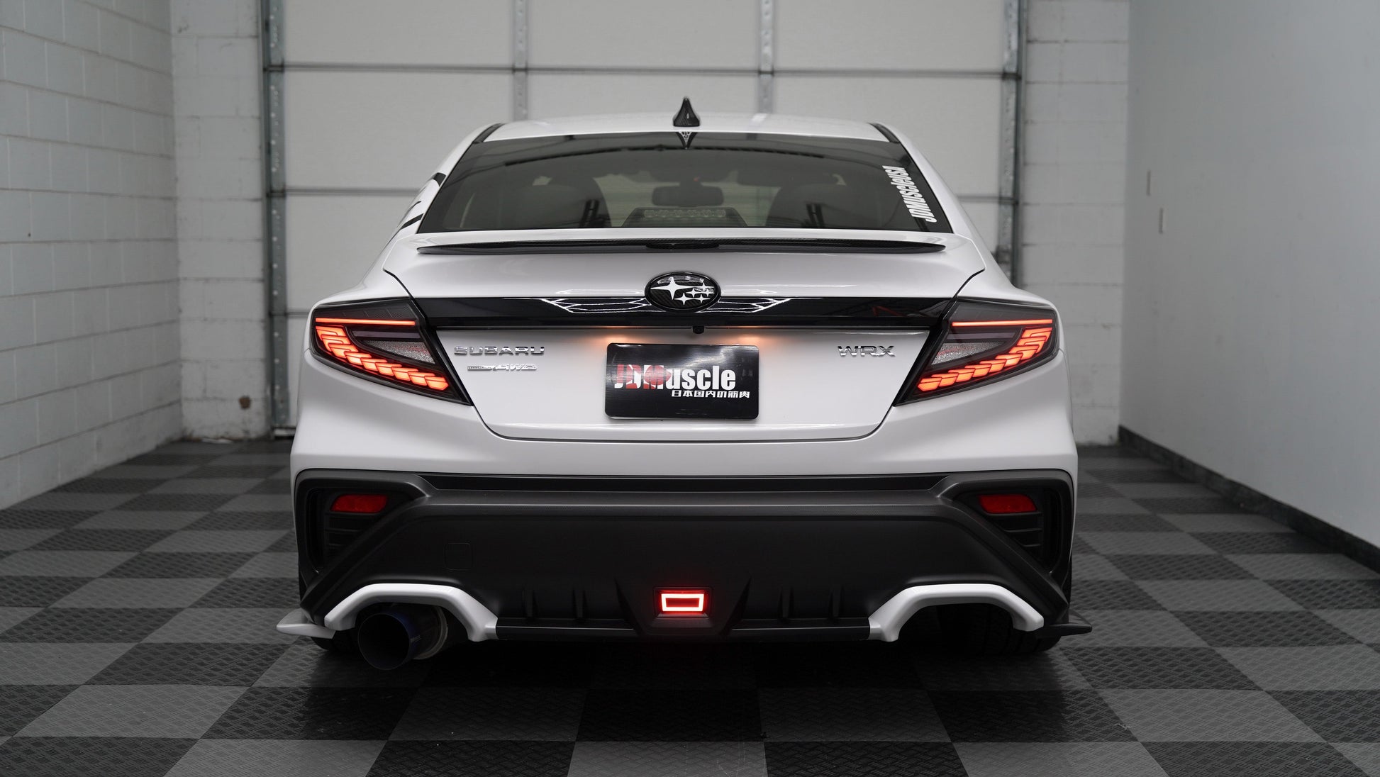 JDMuscle Version Doragon LED Tail Lights installed on a 2022-2025 Subaru WRX, showcasing bright red and clear lens design.