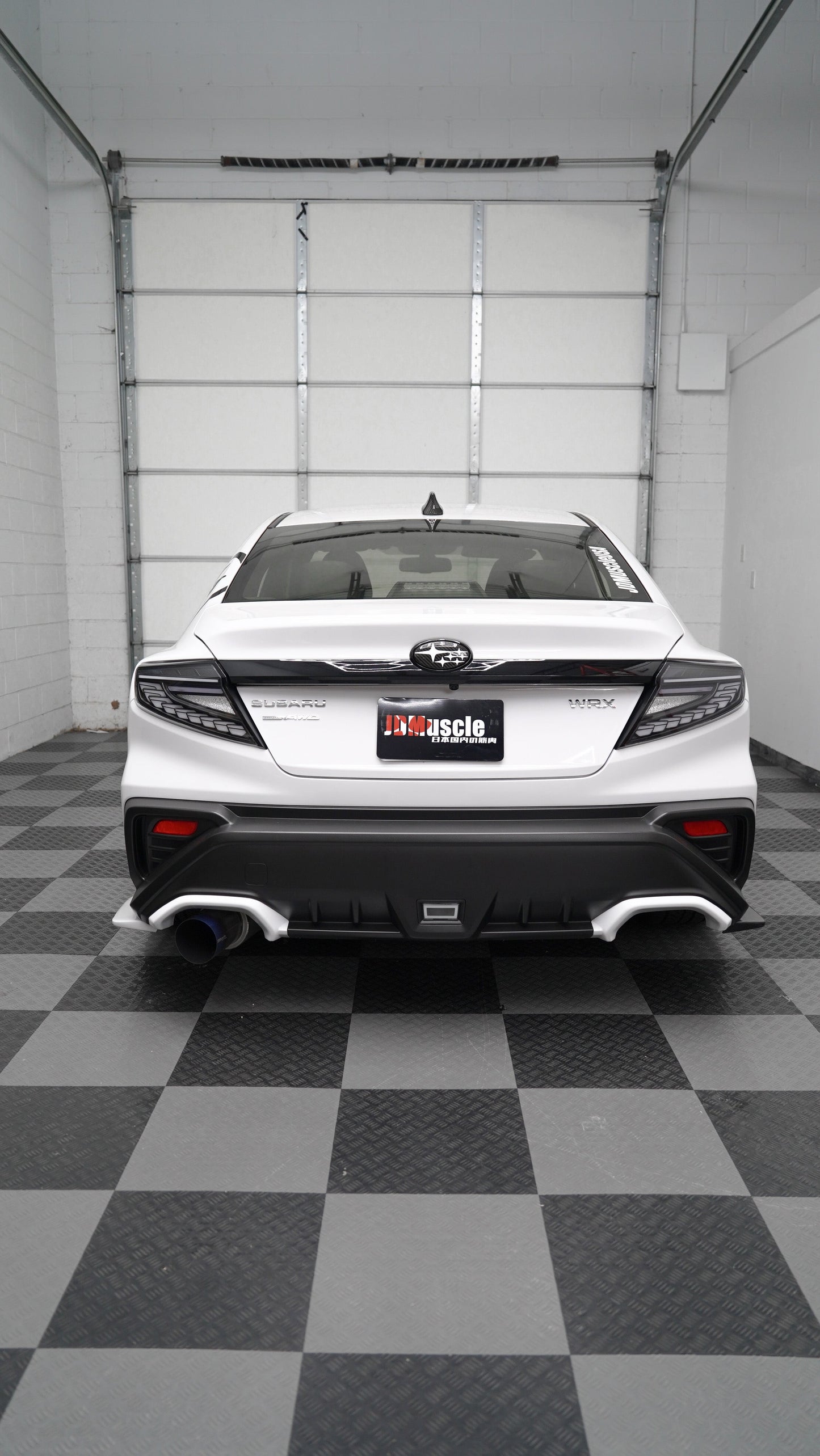 JDMuscle Doragon LED tail lights installed on a 2022-2025 Subaru WRX, showcasing sleek red and clear lens design.