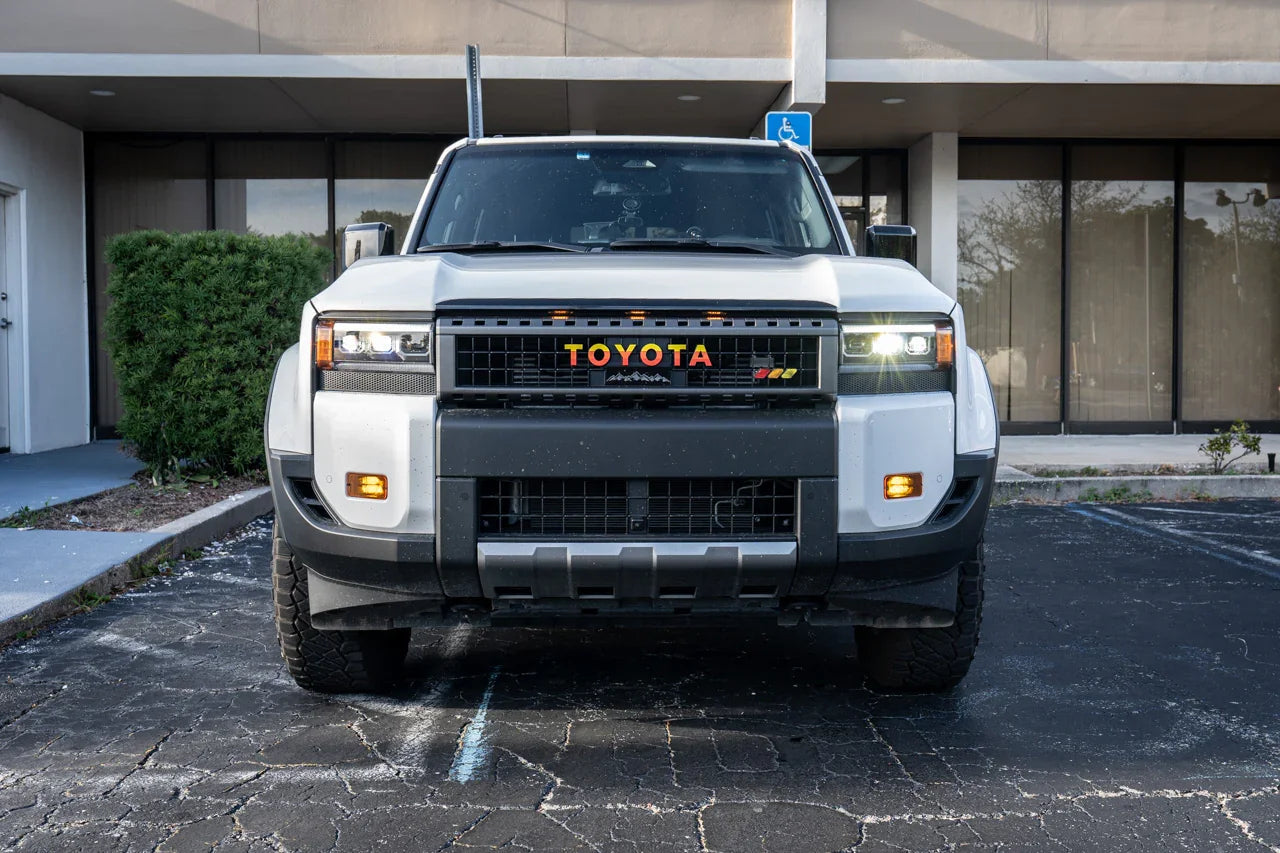 Tri color topographic grille emblem sticker for 2024+ Land Cruiser and 2013-2016 Tacoma, vinyl exterior decal by StickerFab.