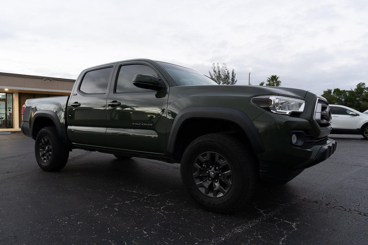 Smoked vinyl sidemarker overlays for front of 2016-2023 Toyota Tacoma, exterior automotive accessory by StickerFab.