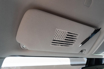 Vinyl interior sun visor airbag label overlay featuring distressed American flag design for 2016-2023 Toyota Tacoma by StickerFab