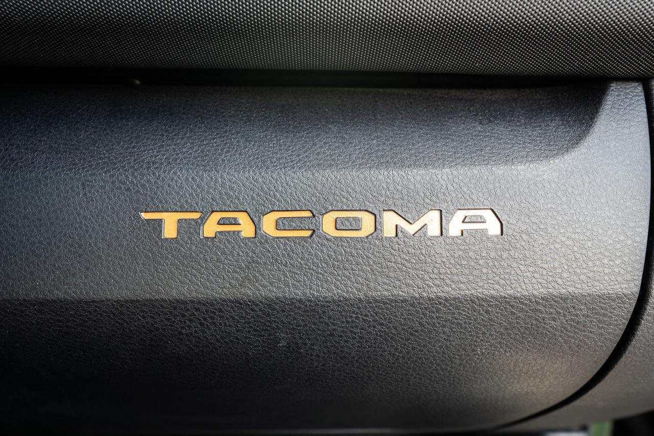 Vinyl glove box with Tacoma logo inlays, standard series interior accessory for 2016-2023 Toyota Tacoma by StickerFab