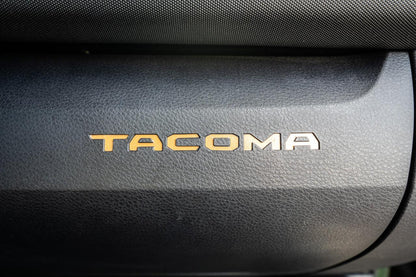 Vinyl glove box with Tacoma logo inlays, standard series interior accessory for 2016-2023 Toyota Tacoma by StickerFab