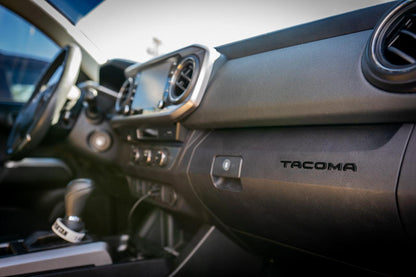 2016-2023 Tacoma glove box with StickerFab acrylic "TACOMA" logo inlays, vinyl interior, laser series design