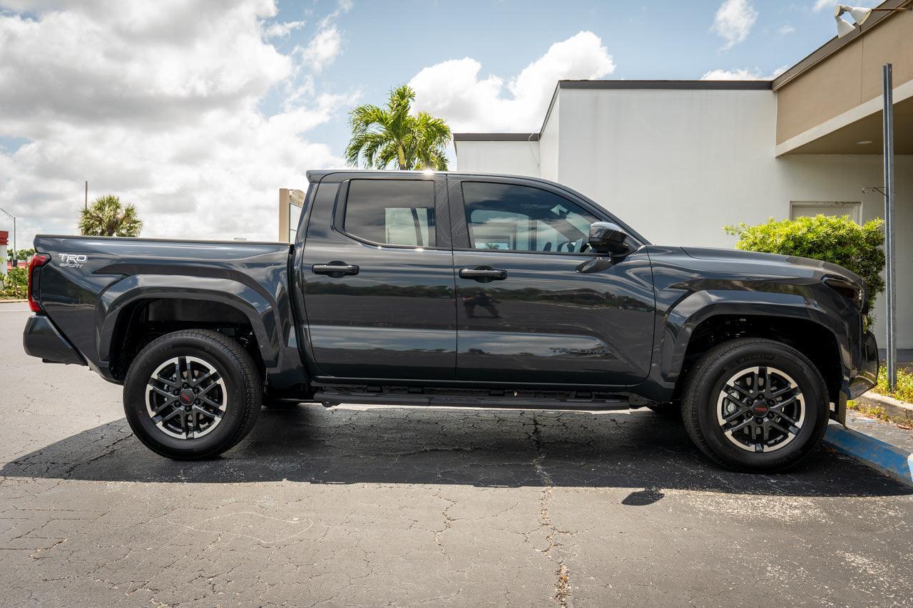 Smoked vinyl front sidemarker overlays for 2024+ Toyota Tacoma, exterior automotive accessories by StickerFab.