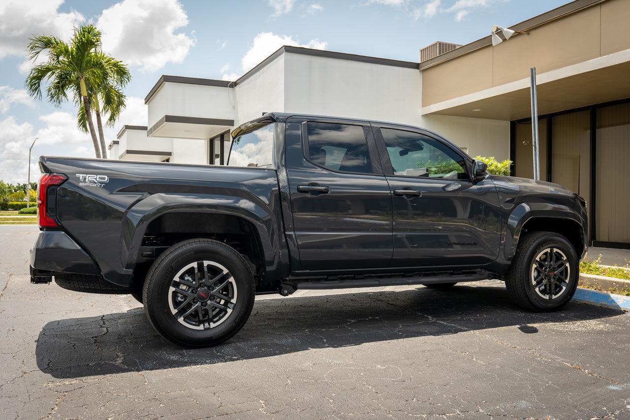 Smoked vinyl front sidemarker overlays for 2024+ Toyota Tacoma by StickerFab, exterior accessory for enhanced vehicle appearance.